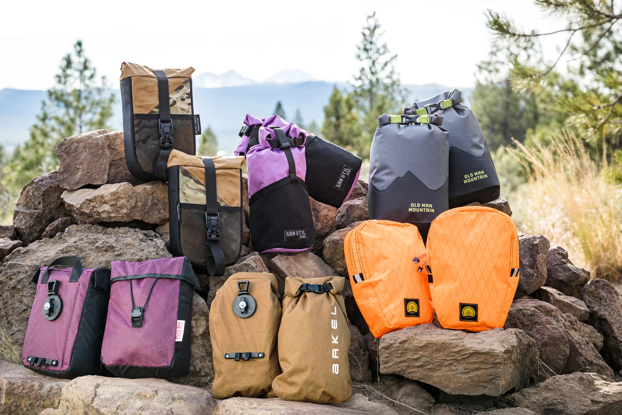 5 fabricantes de paquetes de bicicleta adoptan el monte y el soporte de la jaula y la bolsa de Old Man Mountain